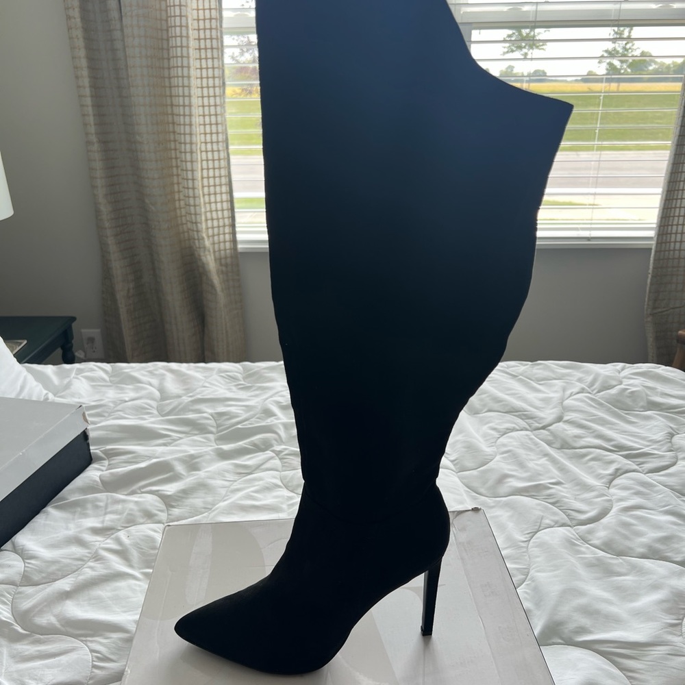 Nine West Brand New sexy boot. Wide calf size 10.5 Black boot.